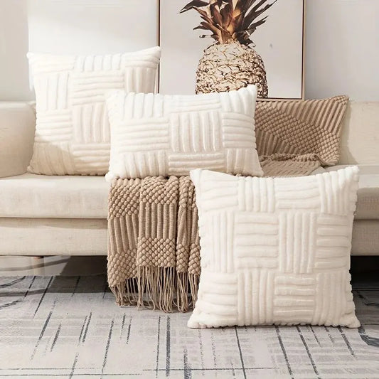 White boho faux fur throw pillow cover on sofa