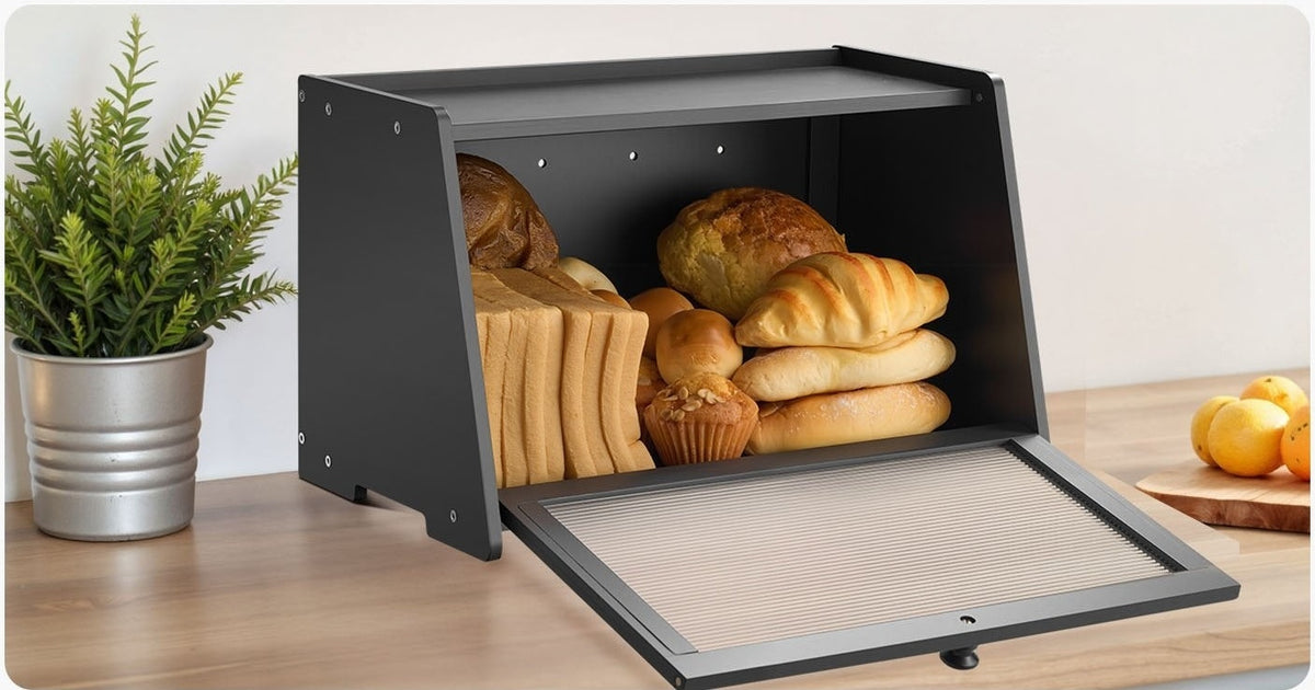 Black bread box with its door open, holding sliced bread, rolls and croissants