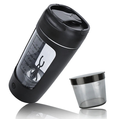 Black electric protein shaker bottle at an angled view with powder cup for protein shakes.