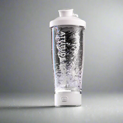 White 650 ml electric protein shaker blending a drink for gym and travel use.