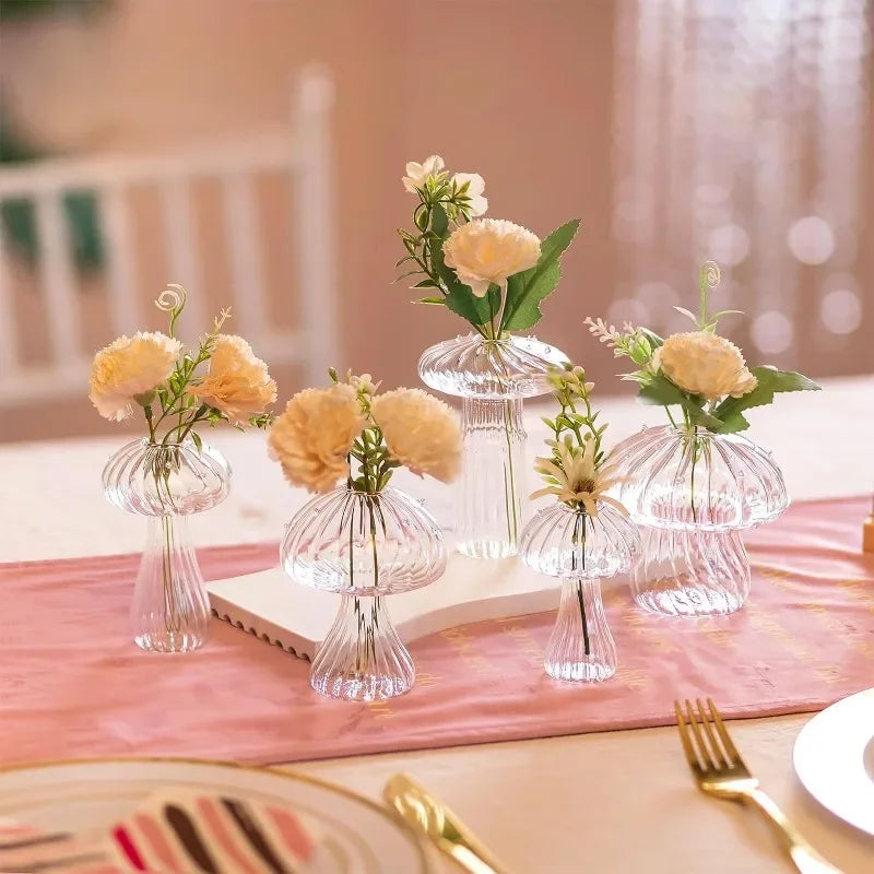Package list showing five clear mushroom glass vases with flowers included
