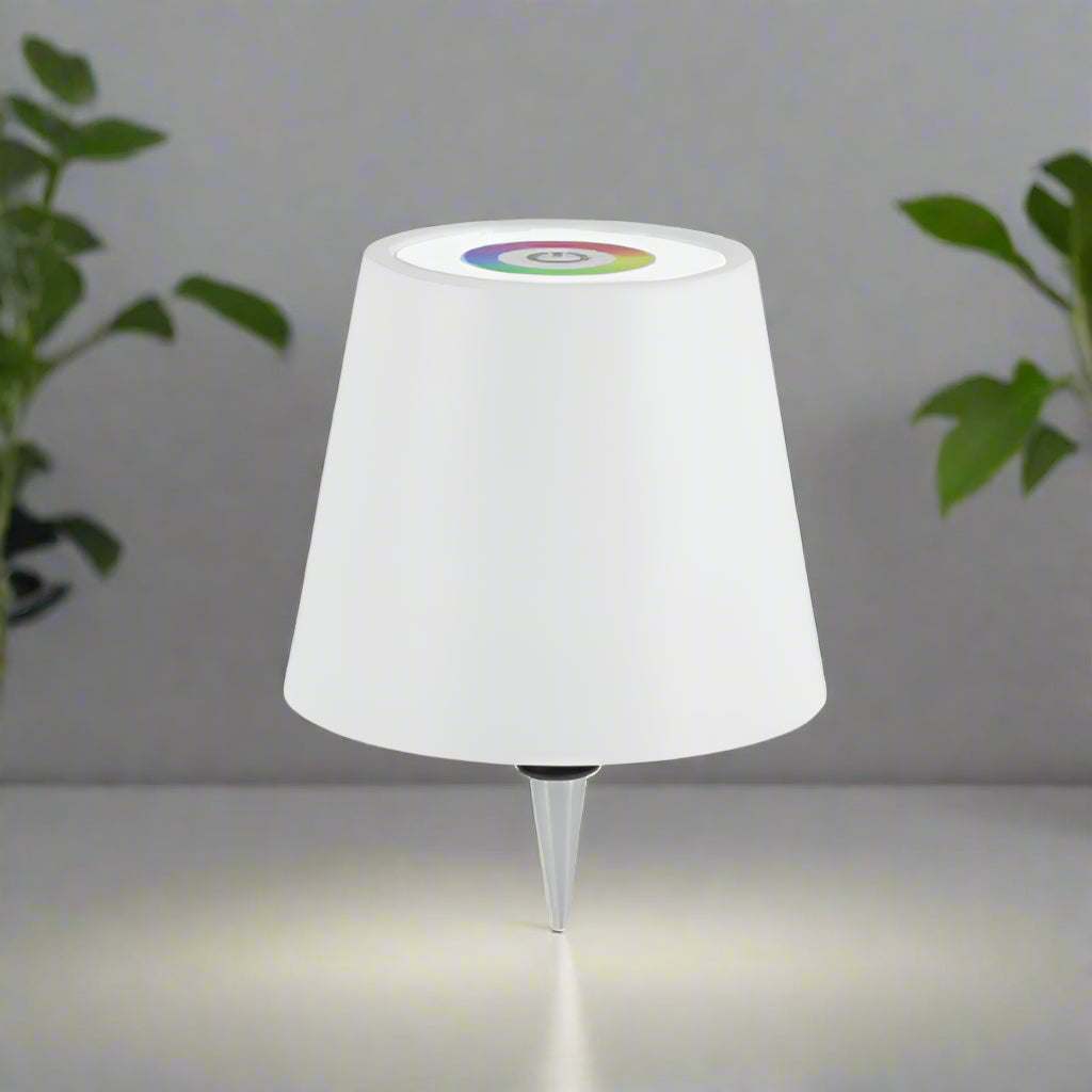 White outdoor lamp with a colorful light bulb on a gray background